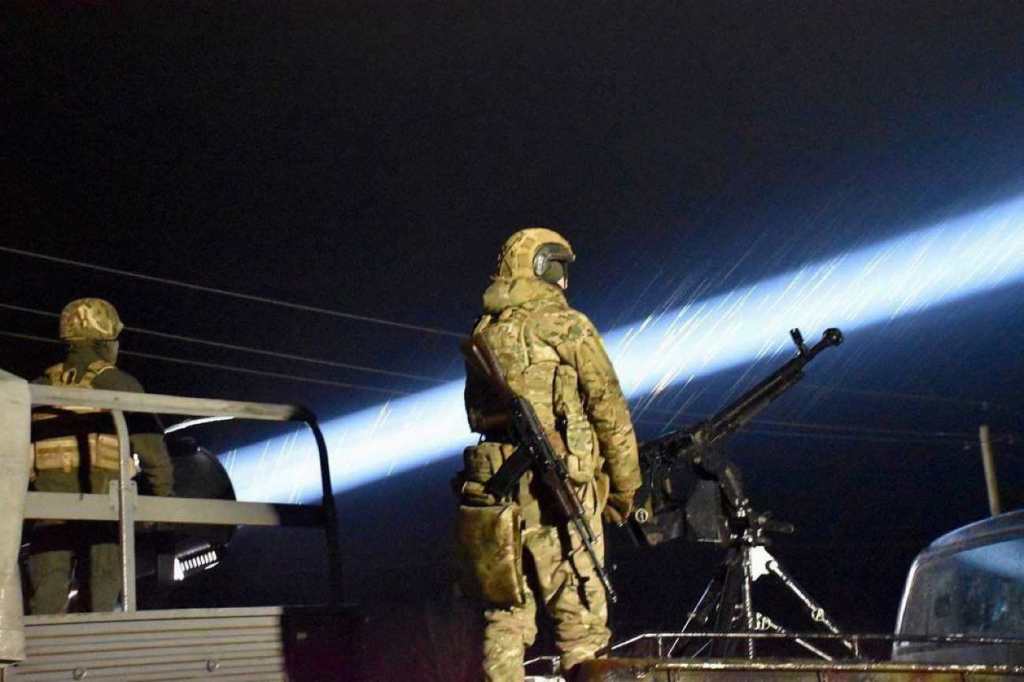 DShK anti-aircraft gun and searchlights