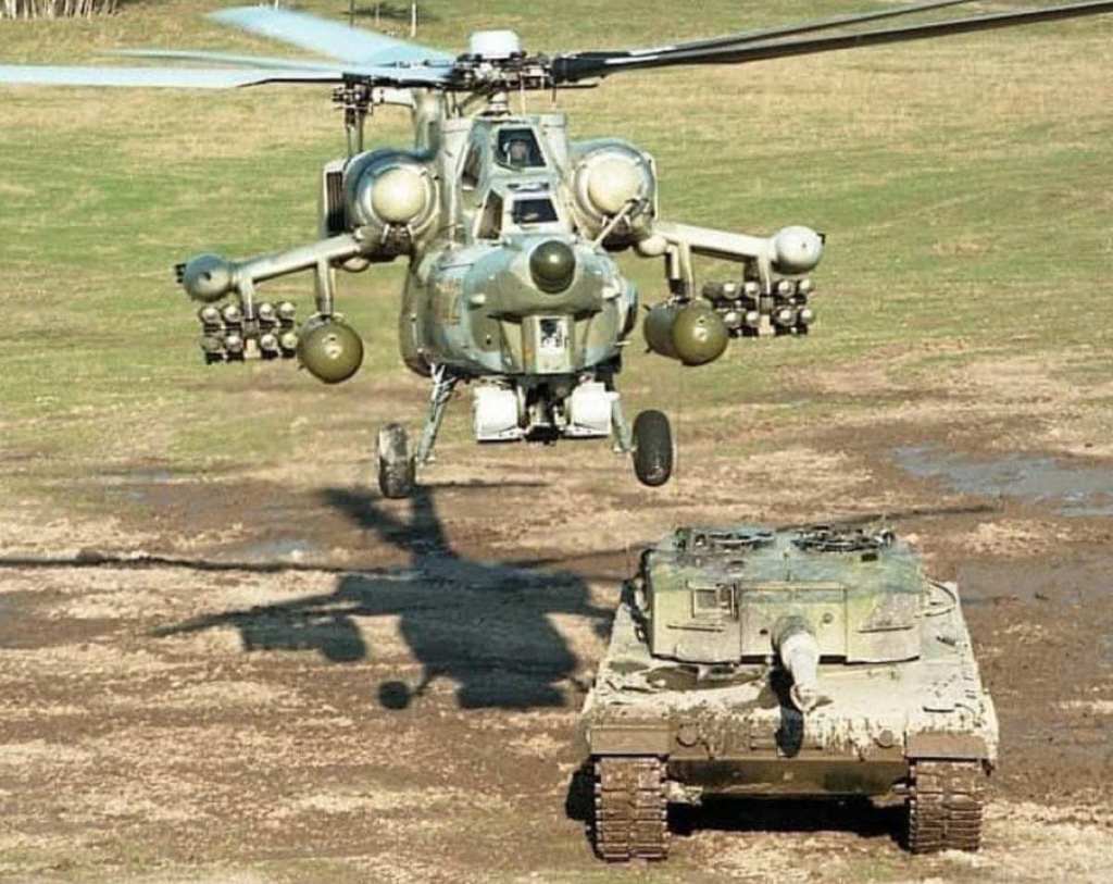 Russian Mi-28 Havoc attack helicopter & a Swedish Stridsvagn-121