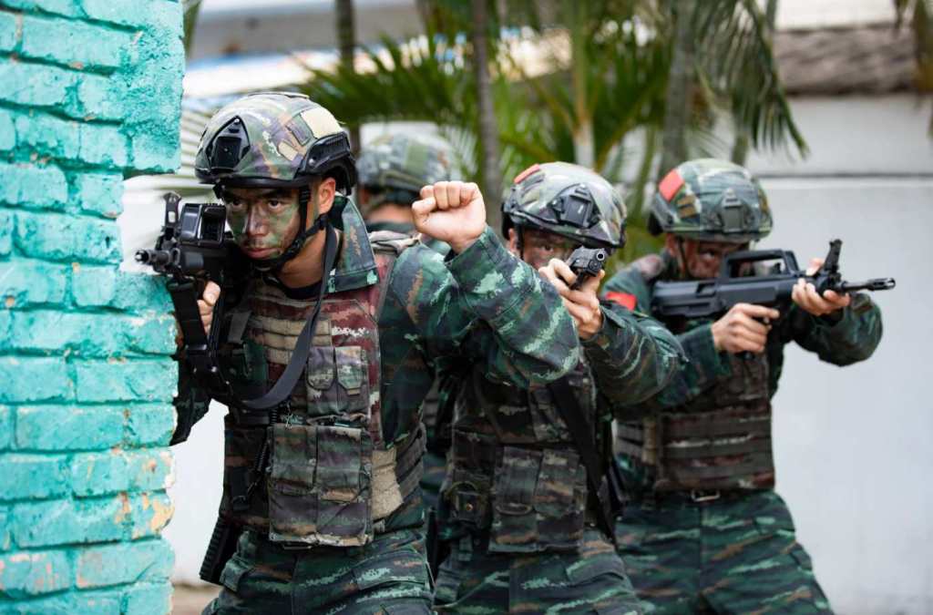 Chinese troops practicing house-breaching and room-clearing tactics