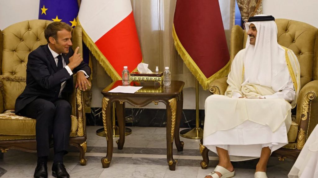 French President Emmanuel Macron and the Emir of Qatar Sheikh Tamim bin Hamad Al-Thani