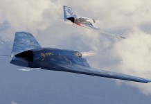 Russian Su-57 “Outpacing” F-35, J-20 For Drone Wars; Sukhoi Boosts ‘Felon’ Stealth Fighter’s Range & Lethality sukhoi s-70 okhotnik