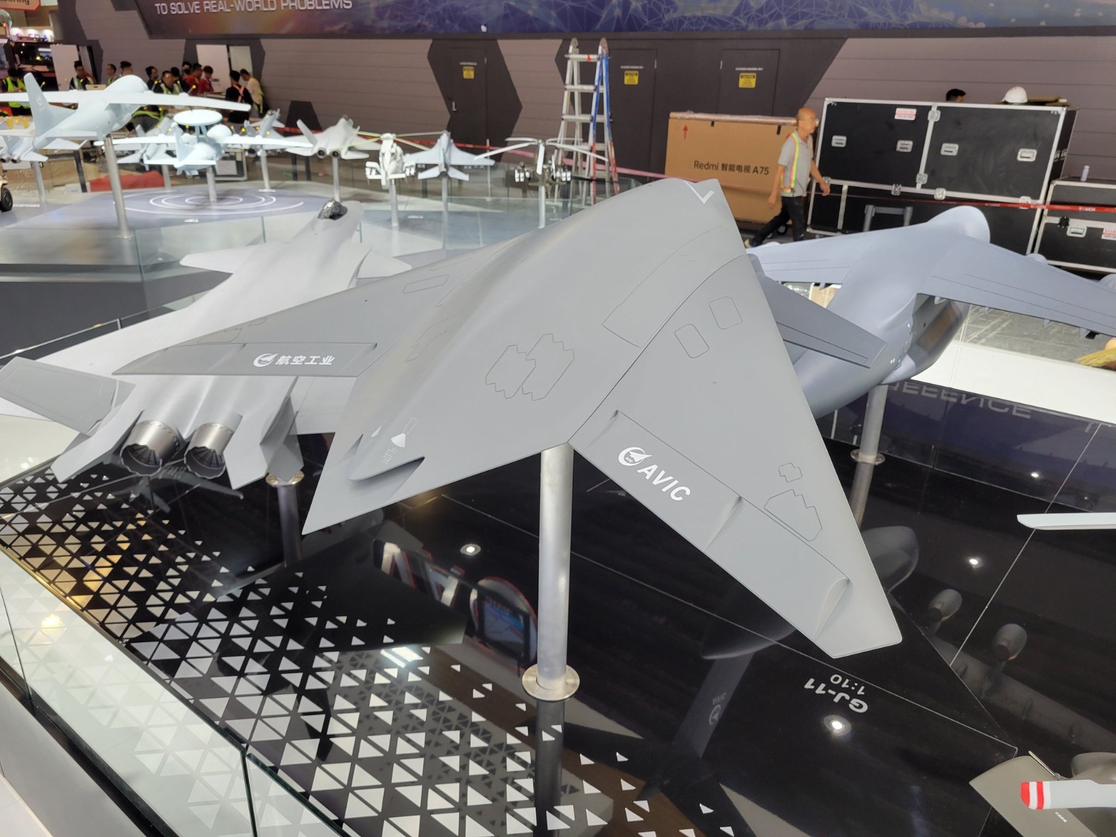 China Flaunts 'Carrier-Compatible' GJ-11 Sharp Sword UCAV At Singapore ...