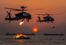U.S. Apache & Seahawk Helos Annihilate Iranian Boats in Hormuz; Trump Pauses Project Freedom For Peace Talks