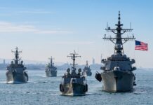 First Time — A U.S. Carrier Strike Group Sails with a Medium USV as USS Roosevelt Leads the Way